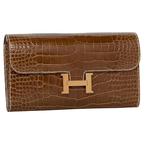 hermes constance crocodile clutch|Hermes constance vintage.